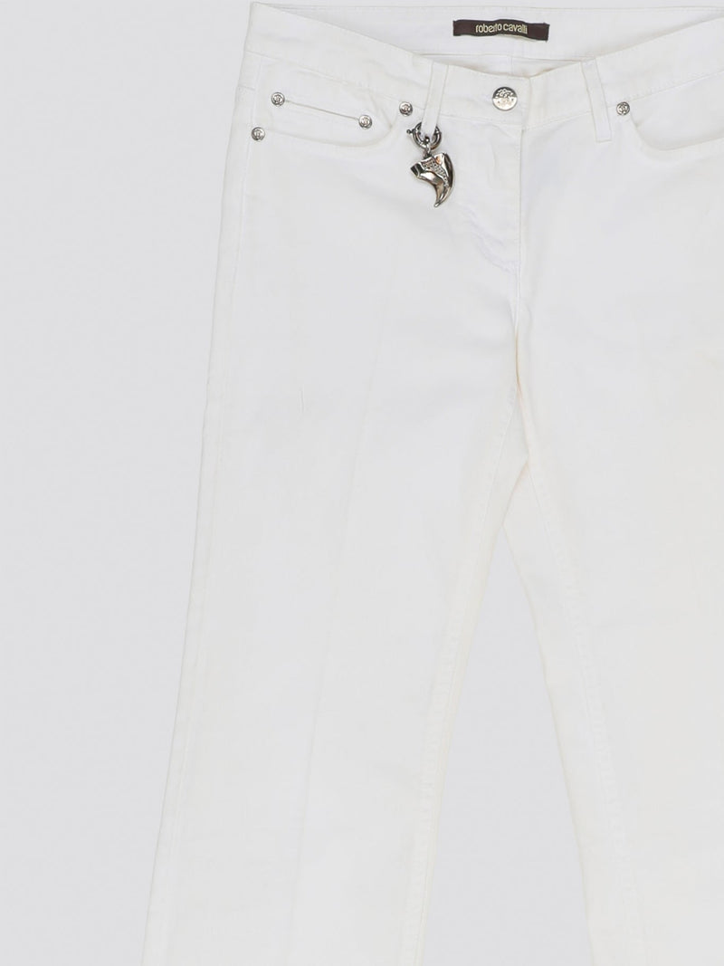 Elevate your denim game with these stunning White Wide Leg Denim Jeans from Roberto Cavalli. Crafted from premium quality denim, these jeans feature a sophisticated wide leg silhouette that exudes elegance and style. Perfect for day or night, these jeans are a versatile must-have addition to your wardrobe.