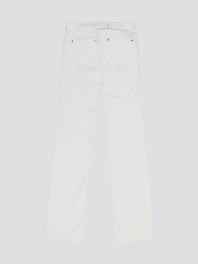 Elevate your denim game with these stunning White Wide Leg Denim Jeans from Roberto Cavalli. Crafted from premium quality denim, these jeans feature a sophisticated wide leg silhouette that exudes elegance and style. Perfect for day or night, these jeans are a versatile must-have addition to your wardrobe.