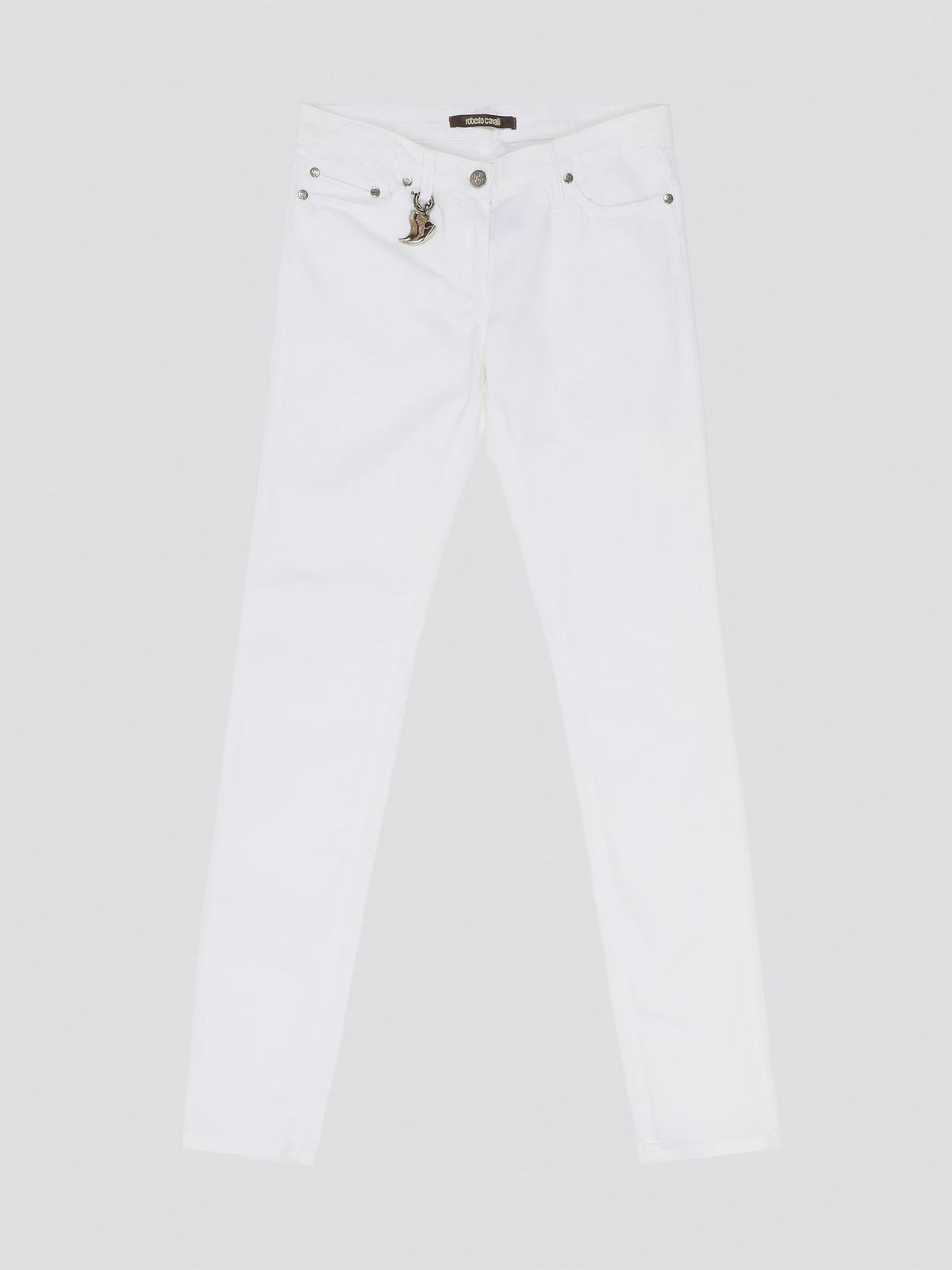 Indulge in timeless elegance and modern sophistication with these White Straight Leg Jeans by Roberto Cavalli. Crafted with precision and attention to detail, these jeans feature a sleek silhouette that effortlessly complements any ensemble. Elevate your everyday wardrobe with a touch of luxury and style with these iconic Roberto Cavalli jeans.