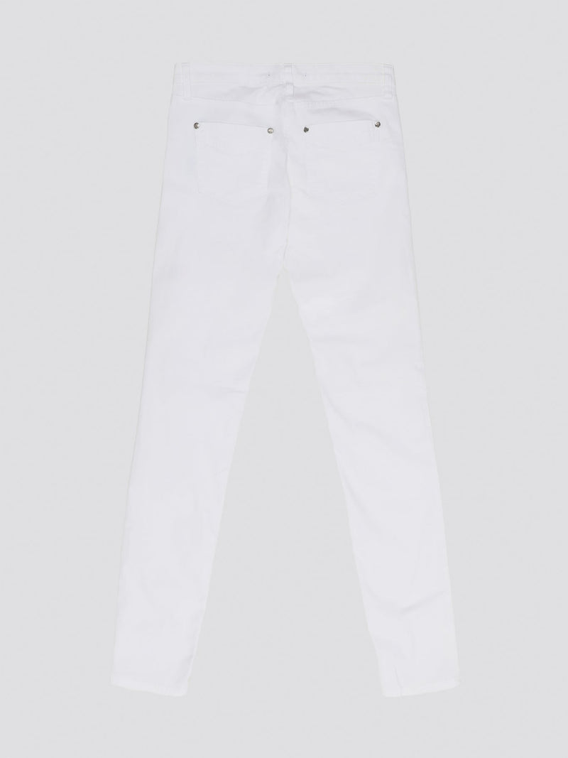 Indulge in timeless elegance and modern sophistication with these White Straight Leg Jeans by Roberto Cavalli. Crafted with precision and attention to detail, these jeans feature a sleek silhouette that effortlessly complements any ensemble. Elevate your everyday wardrobe with a touch of luxury and style with these iconic Roberto Cavalli jeans.