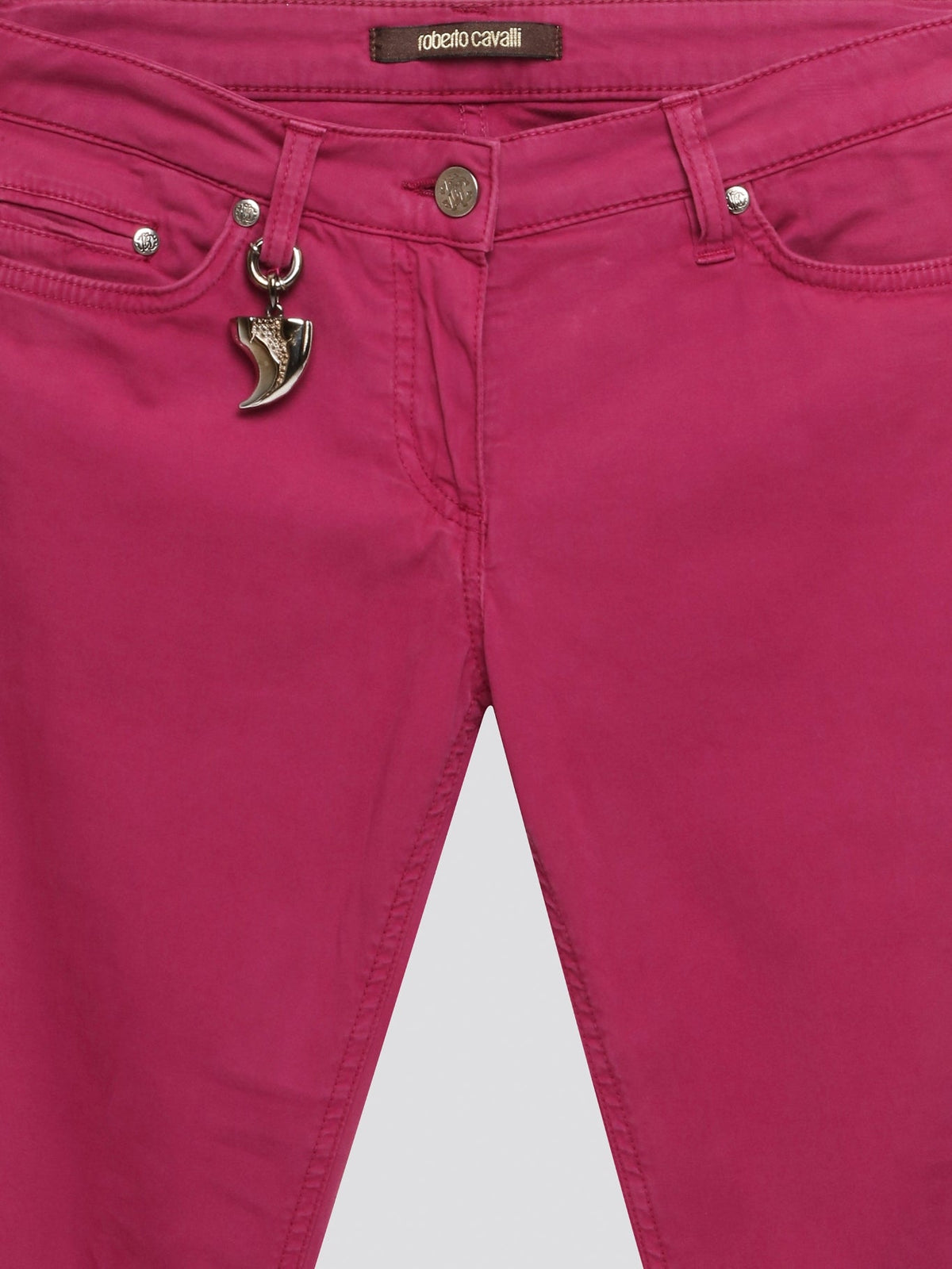 Step out in style with these Pink Skinny Denim Jeans from Roberto Cavalli, the epitome of high fashion and luxury. Crafted with precision and attention to detail, the vibrant pink color adds a fun and feminine touch to your wardrobe. Whether you dress them up or down, these jeans are sure to make a statement wherever you go.