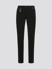 Step out in style with these sleek and versatile Black Skinny Fit Jeans from Roberto Cavalli. Made from premium quality denim, these jeans hug your curves in all the right places while offering unbeatable comfort. Whether dressed up with heels or down with sneakers, these jeans are a must-have for any fashion-forward wardrobe.