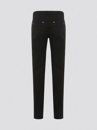 Step out in style with these sleek and versatile Black Skinny Fit Jeans from Roberto Cavalli. Made from premium quality denim, these jeans hug your curves in all the right places while offering unbeatable comfort. Whether dressed up with heels or down with sneakers, these jeans are a must-have for any fashion-forward wardrobe.