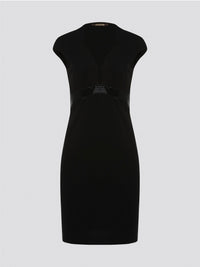 Step into the spotlight and command attention in this stunning Black Embellished Bodycon Dress from Roberto Cavalli. The intricate embellishments and figure-hugging silhouette will have all eyes on you, making you stand out from the crowd at any event. Elevate your wardrobe with this luxurious and unique piece that exudes glamour and confidence.