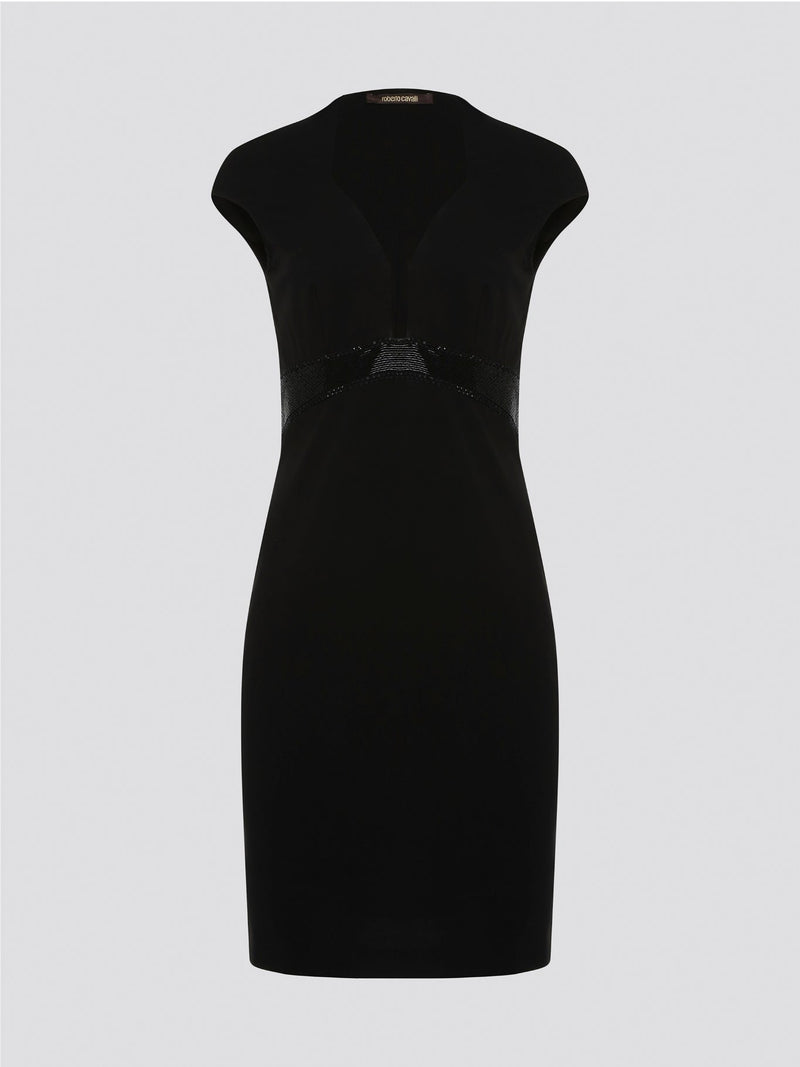 Step into the spotlight and command attention in this stunning Black Embellished Bodycon Dress from Roberto Cavalli. The intricate embellishments and figure-hugging silhouette will have all eyes on you, making you stand out from the crowd at any event. Elevate your wardrobe with this luxurious and unique piece that exudes glamour and confidence.