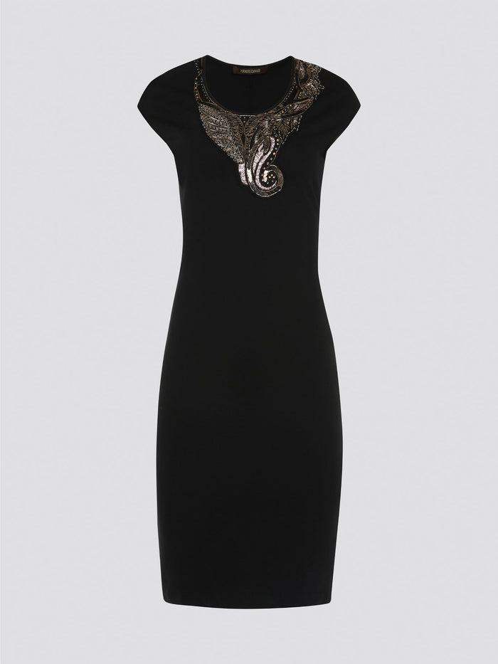 Make a bold statement in the sleek and edgy Black Studded Bodycon Dress from Roberto Cavalli. The figure-hugging silhouette is adorned with shimmering studs, creating a rockstar-worthy look that is sure to turn heads. Perfect for a night out on the town or a special event, this dress will ensure you stand out in style.