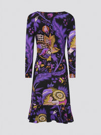 Elevate your wardrobe with the Foliage Plunge Flared Dress by Roberto Cavalli, a stunning piece that exudes sophistication and elegance. The intricate foliage print and plunging neckline create a striking contrast, making this dress a true statement piece for any special occasion. With a flattering flared silhouette and luxurious fabric, you'll feel like a modern goddess every time you slip into this exquisite garment.