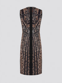 Fade into the wild with the Roberto Cavalli Leopard Print Sheath Dress. This fierce and fabulous statement piece will turn heads wherever you go, exuding confidence and sophistication. Embrace your inner predator and unleash your stylish prowess with this bold and daring dress.