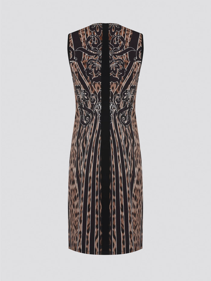 Fade into the wild with the Roberto Cavalli Leopard Print Sheath Dress. This fierce and fabulous statement piece will turn heads wherever you go, exuding confidence and sophistication. Embrace your inner predator and unleash your stylish prowess with this bold and daring dress.