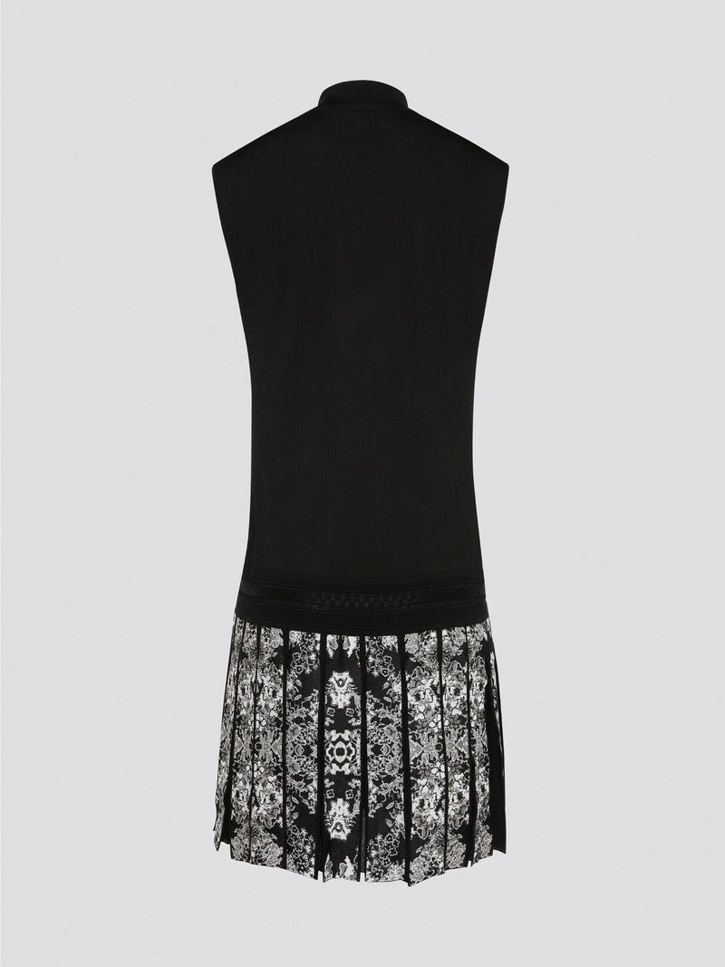 Step into the sleek and exotic world of Roberto Cavalli with this stunning Foliage Pleated Keyhole Dress. Featuring intricate pleating and a bold keyhole neckline, this dress is the perfect choice for a special occasion or a night out on the town. Embrace your inner goddess and make a statement in this one-of-a-kind piece from the legendary designer Roberto Cavalli.