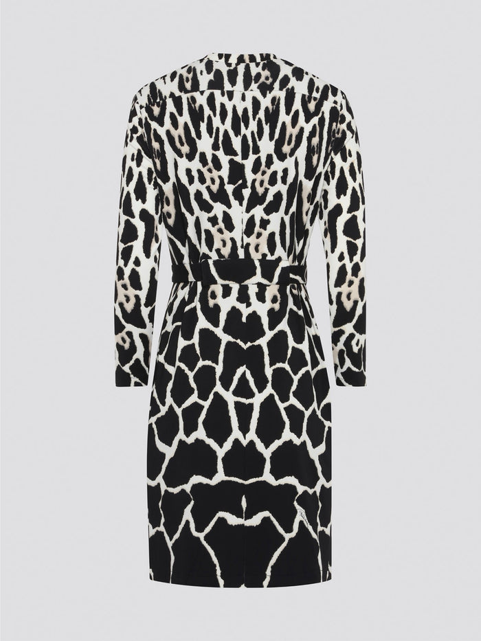 Unleash your wild side with our Roberto Cavalli Leopard Print Wrap Dress! This fierce and fabulous piece is designed to make a statement, with its bold print and flattering wrap silhouette. Whether you're hitting the town with friends or strutting your stuff at a special event, this dress is guaranteed to turn heads and have all eyes on you.