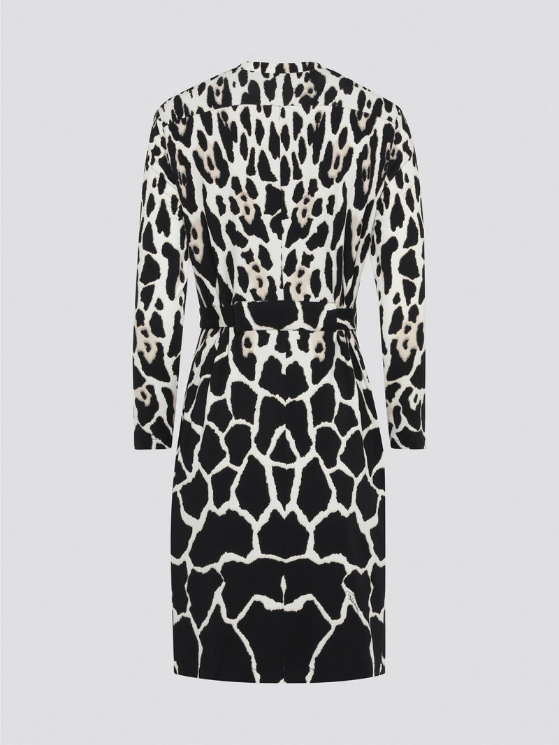 Unleash your wild side with our Roberto Cavalli Leopard Print Wrap Dress! This fierce and fabulous piece is designed to make a statement, with its bold print and flattering wrap silhouette. Whether you're hitting the town with friends or strutting your stuff at a special event, this dress is guaranteed to turn heads and have all eyes on you.