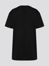 Step up your streetwear game with this Roberto Cavalli Black Logo Print Oversized T-Shirt. Emblazoned with the brand's iconic logo in a bold graphic print, this tee is sure to make a statement wherever you go. The oversized fit adds a touch of urban edge, perfect for pairing with your favorite jeans or joggers for a stylish yet comfortable look.