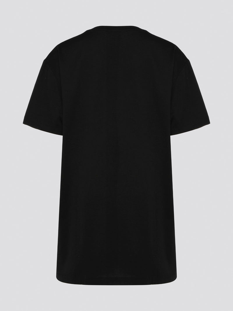 Step up your streetwear game with this Roberto Cavalli Black Logo Print Oversized T-Shirt. Emblazoned with the brand's iconic logo in a bold graphic print, this tee is sure to make a statement wherever you go. The oversized fit adds a touch of urban edge, perfect for pairing with your favorite jeans or joggers for a stylish yet comfortable look.