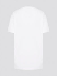 Elevate your casual style with the White Printed Oversized T-Shirt from Roberto Cavalli. Made with premium cotton fabric, this tee features a bold and eye-catching print that will set you apart from the crowd. Whether you dress it up with heels or keep it cool with sneakers, this statement piece is a must-have for your wardrobe.