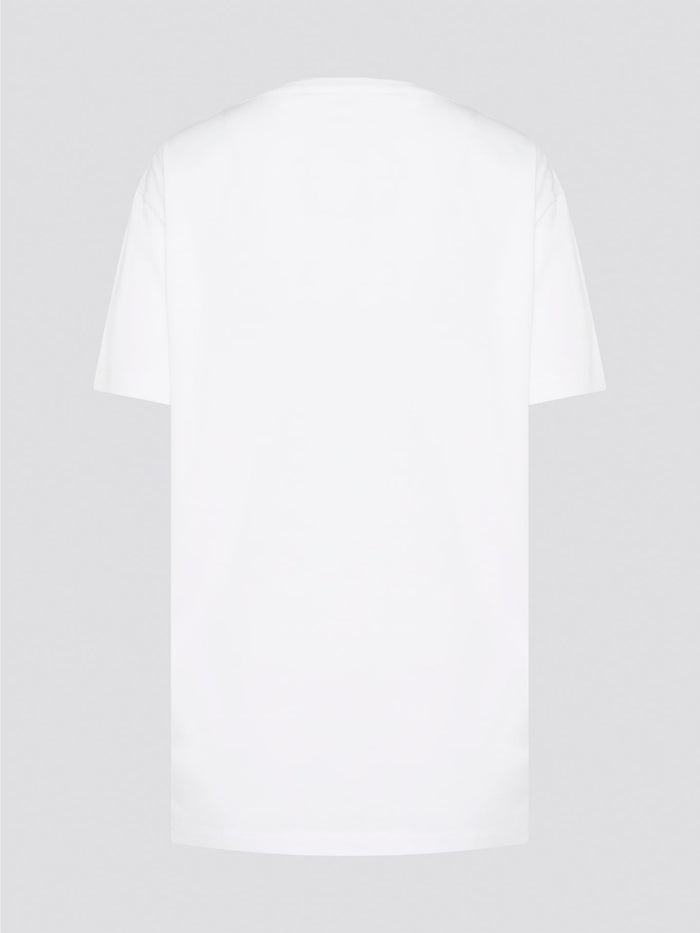 Elevate your casual style with the White Printed Oversized T-Shirt from Roberto Cavalli. Made with premium cotton fabric, this tee features a bold and eye-catching print that will set you apart from the crowd. Whether you dress it up with heels or keep it cool with sneakers, this statement piece is a must-have for your wardrobe.