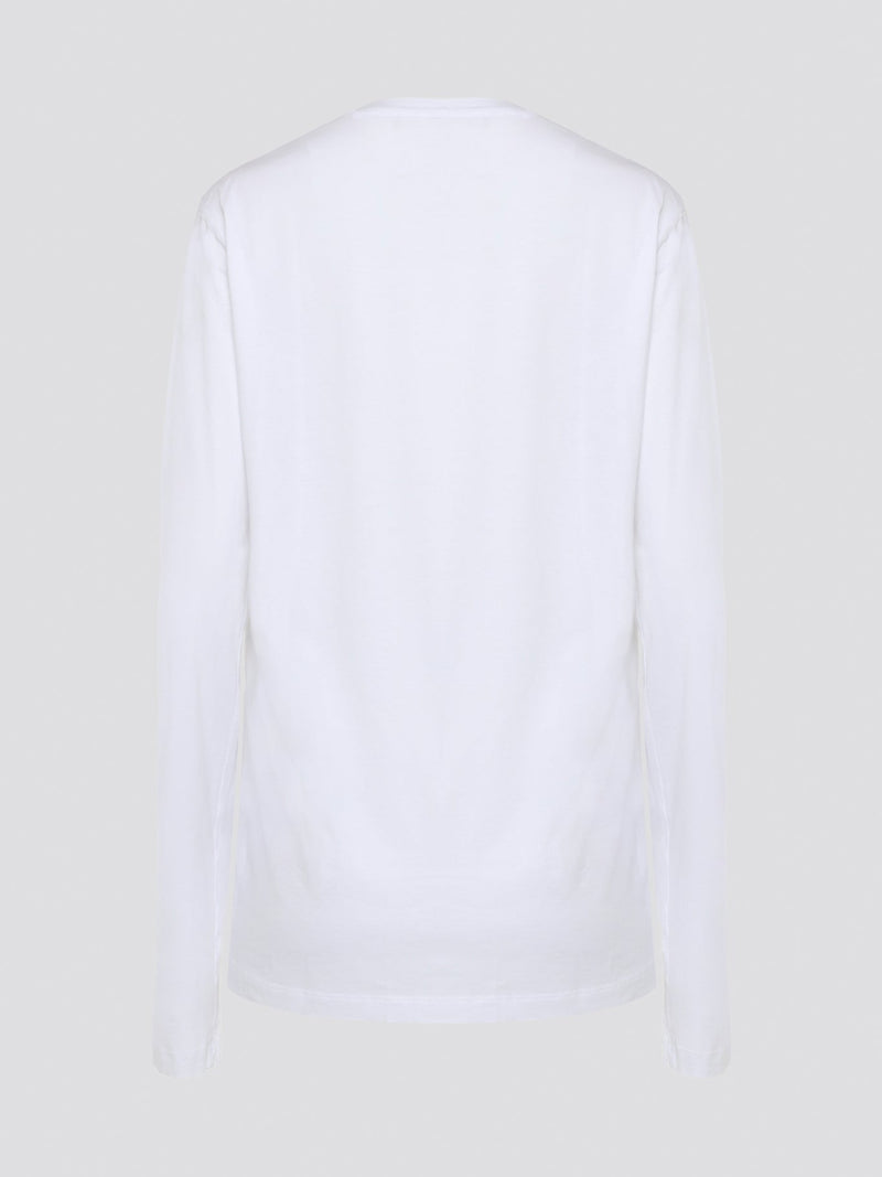 Elevate your wardrobe with the timeless sophistication of the Roberto Cavalli White Printed Long Sleeve Shirt. Made from luxurious, high-quality fabric, this shirt features a captivating print that adds a touch of modern flair to your look. Whether worn casually or dressed up for a night out, this shirt is sure to make a statement and turn heads wherever you go.