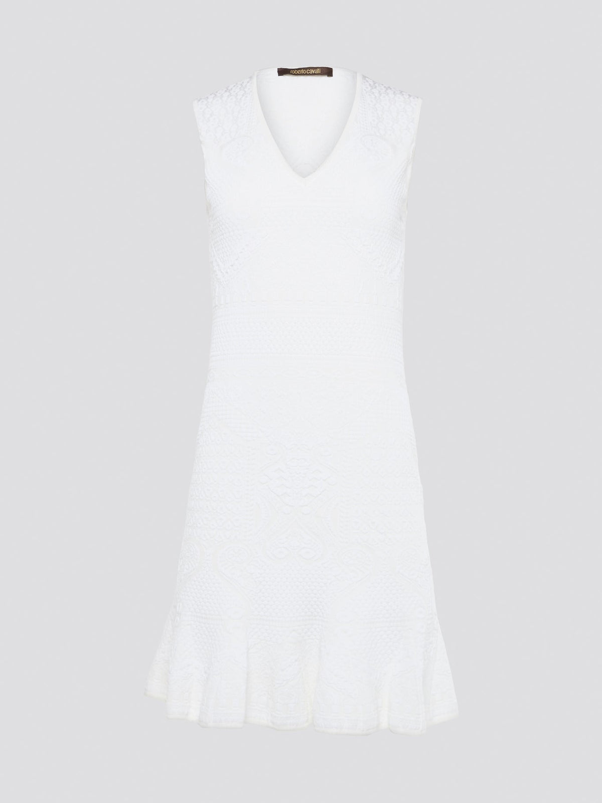 Feel effortlessly chic and sophisticated in this stunning White Sleeveless Mini Dress by Roberto Cavalli. The epitome of Italian luxury, the dress features a flattering silhouette and intricate detailing that is sure to turn heads. Perfect for any occasion, whether it's a summer soir��e or a glamorous night out, this dress is a must-have for any fashion-forward woman.