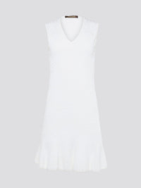 Feel effortlessly chic and sophisticated in this stunning White Sleeveless Mini Dress by Roberto Cavalli. The epitome of Italian luxury, the dress features a flattering silhouette and intricate detailing that is sure to turn heads. Perfect for any occasion, whether it's a summer soir��e or a glamorous night out, this dress is a must-have for any fashion-forward woman.