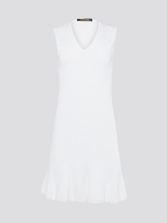 Feel effortlessly chic and sophisticated in this stunning White Sleeveless Mini Dress by Roberto Cavalli. The epitome of Italian luxury, the dress features a flattering silhouette and intricate detailing that is sure to turn heads. Perfect for any occasion, whether it's a summer soir��e or a glamorous night out, this dress is a must-have for any fashion-forward woman.