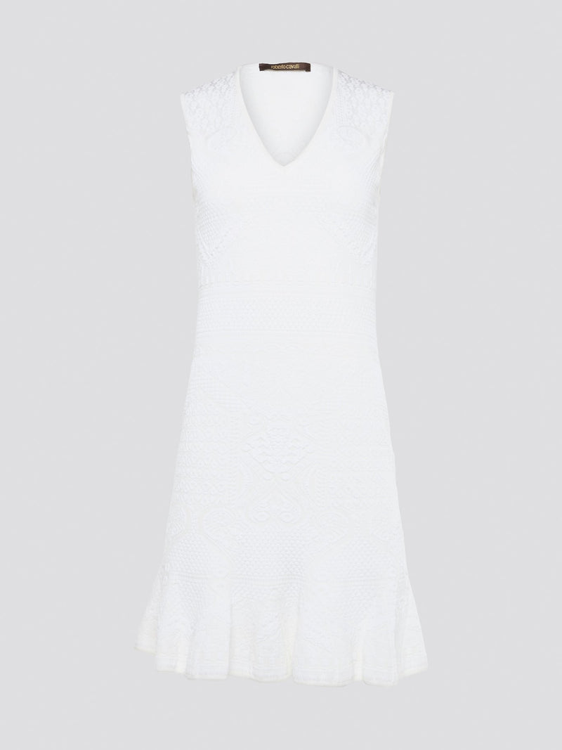 Feel effortlessly chic and sophisticated in this stunning White Sleeveless Mini Dress by Roberto Cavalli. The epitome of Italian luxury, the dress features a flattering silhouette and intricate detailing that is sure to turn heads. Perfect for any occasion, whether it's a summer soir��e or a glamorous night out, this dress is a must-have for any fashion-forward woman.