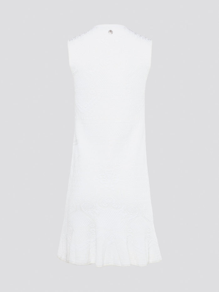 Feel effortlessly chic and sophisticated in this stunning White Sleeveless Mini Dress by Roberto Cavalli. The epitome of Italian luxury, the dress features a flattering silhouette and intricate detailing that is sure to turn heads. Perfect for any occasion, whether it's a summer soir��e or a glamorous night out, this dress is a must-have for any fashion-forward woman.