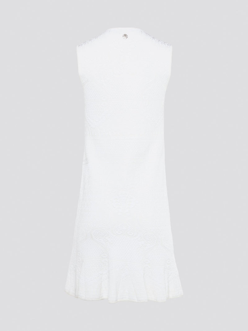 Feel effortlessly chic and sophisticated in this stunning White Sleeveless Mini Dress by Roberto Cavalli. The epitome of Italian luxury, the dress features a flattering silhouette and intricate detailing that is sure to turn heads. Perfect for any occasion, whether it's a summer soir��e or a glamorous night out, this dress is a must-have for any fashion-forward woman.