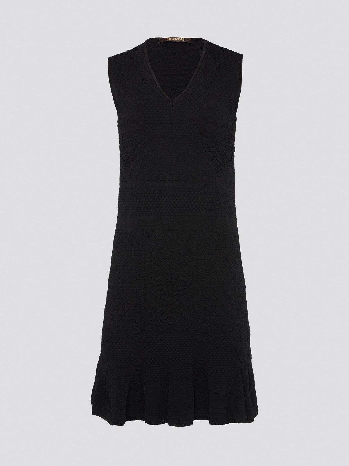 Get ready to turn heads with this stunning black sleeveless mini dress from Roberto Cavalli. This sleek and stylish design features a flattering silhouette that hugs your curves in all the right places. Whether you're hitting the town or attending a special event, this dress is sure to make a statement and elevate your look to the next level.