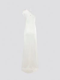 Steal the spotlight in this stunning White Asymmetrical Gown by Roberto Cavalli, perfect for your next glamorous event. With its unique asymmetrical design and flowing silhouette, this gown is sure to turn heads and make you feel like a true fashion icon. Embrace your inner goddess and make a statement in this unforgettable piece that exudes elegance and sophistication.