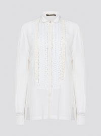 Elevate your wardrobe with this stunning Roberto Cavalli white detailed long sleeve shirt. Crafted with exquisite attention to detail, this shirt features intricate embroidery and embellishments that exude luxury and elegance. Perfect for adding a touch of sophistication to any ensemble, this statement piece is sure to turn heads wherever you go.