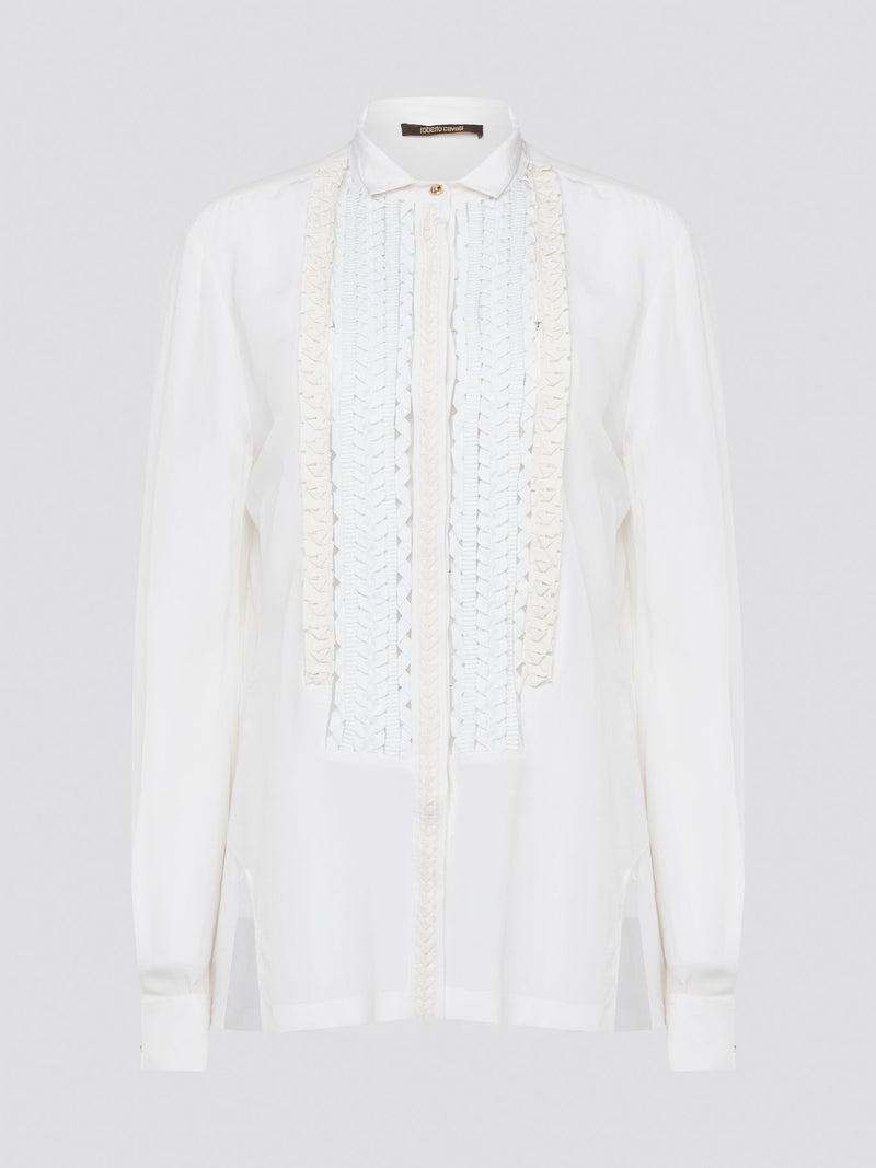 Elevate your wardrobe with this stunning Roberto Cavalli white detailed long sleeve shirt. Crafted with exquisite attention to detail, this shirt features intricate embroidery and embellishments that exude luxury and elegance. Perfect for adding a touch of sophistication to any ensemble, this statement piece is sure to turn heads wherever you go.