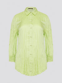 Step into the wild side with this striking green crinkled shirt from Roberto Cavalli. The vibrant hue and unique texture of the fabric will ensure you stand out from the crowd wherever you go. Embrace your fearless fashion sense and unleash your inner style icon with this must-have statement piece.