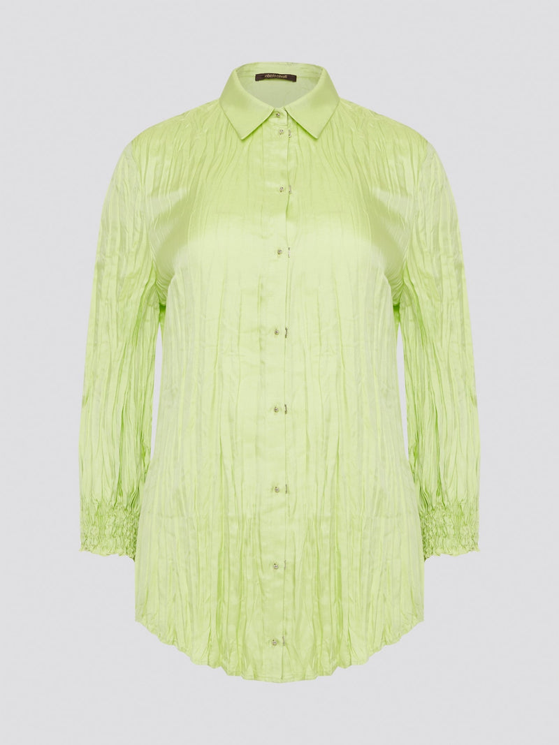 Step into the wild side with this striking green crinkled shirt from Roberto Cavalli. The vibrant hue and unique texture of the fabric will ensure you stand out from the crowd wherever you go. Embrace your fearless fashion sense and unleash your inner style icon with this must-have statement piece.