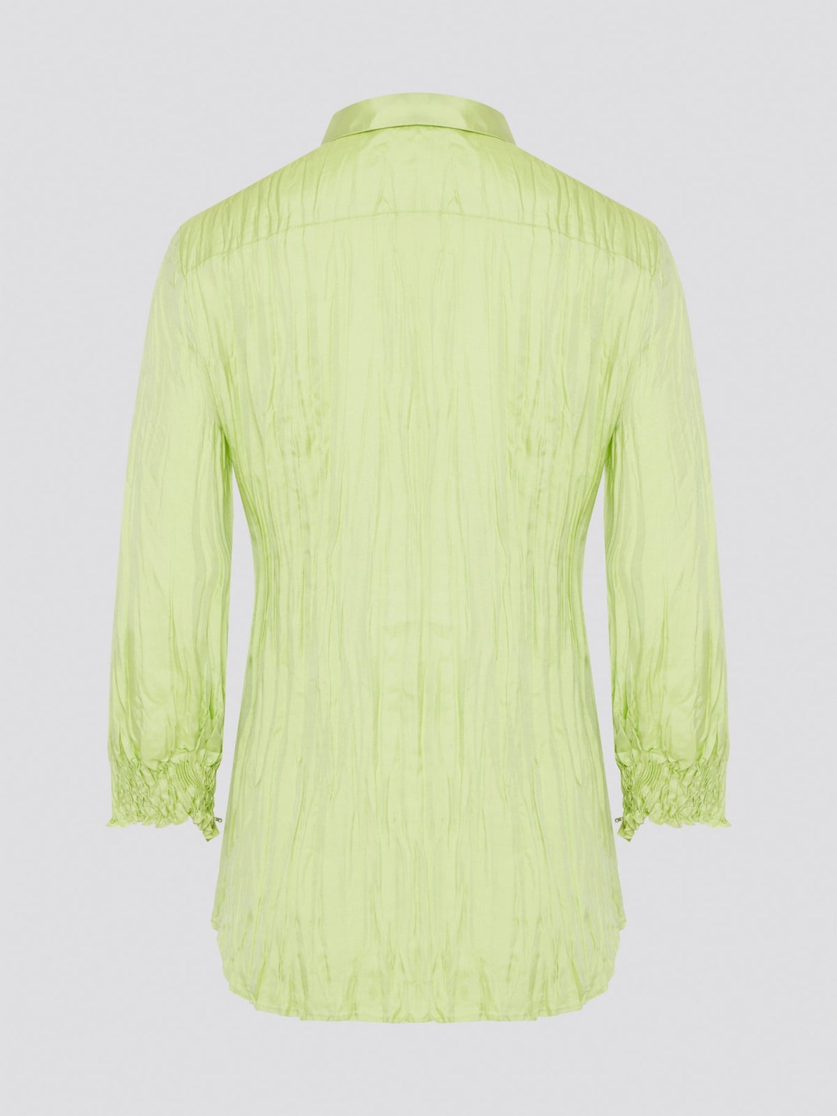 Step into the wild side with this striking green crinkled shirt from Roberto Cavalli. The vibrant hue and unique texture of the fabric will ensure you stand out from the crowd wherever you go. Embrace your fearless fashion sense and unleash your inner style icon with this must-have statement piece.