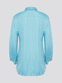 Elevate your wardrobe with the stunning Blue Crinkled Shirt from Roberto Cavalli. Crafted with meticulous attention to detail, this shirt features a unique crinkled texture that adds depth and dimension to any outfit. Whether you're dressing it up for a night out or keeping it casual for a day at the office, this shirt is sure to turn heads and make a statement.