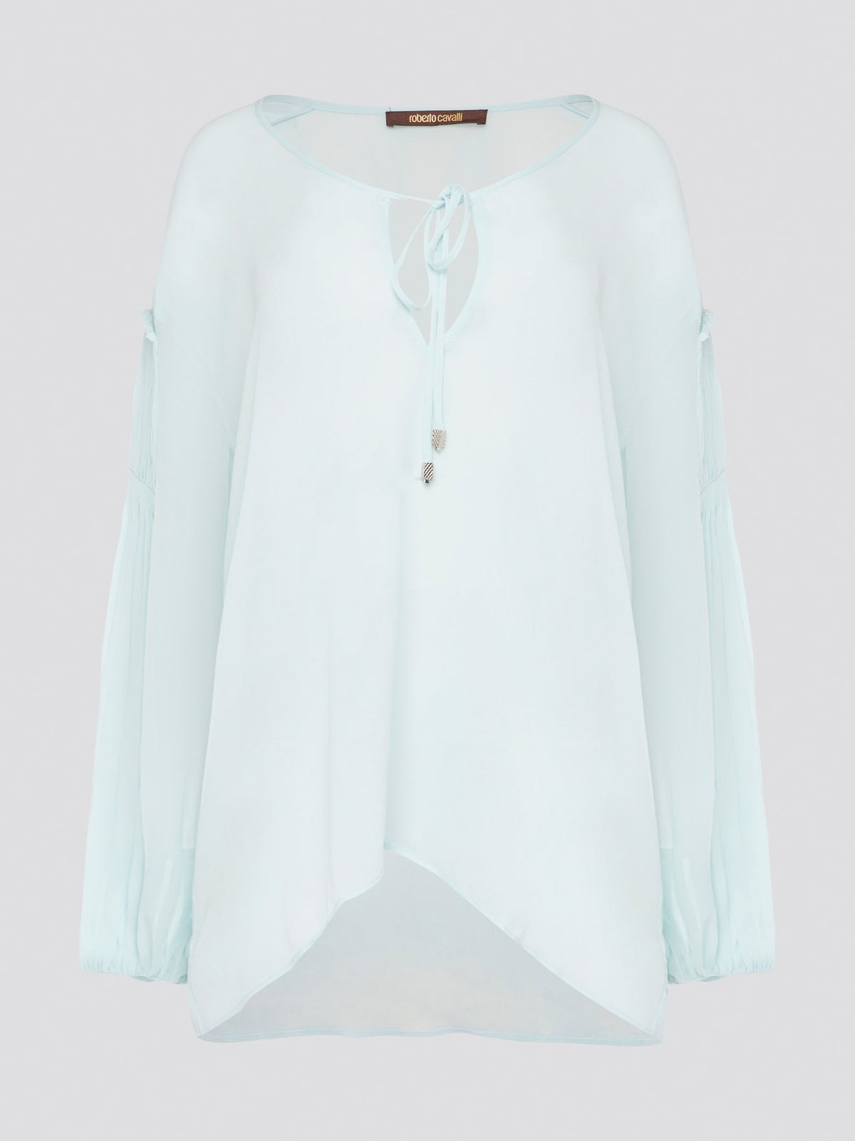 Step up your fashion game with this stunning Mint Green Tie Front Blouse by Roberto Cavalli. The delicate mint green hue and flattering tie front detail will make you stand out in any crowd. Pair it with your favorite jeans for a casual daytime look or dress it up with some sleek trousers for a night out on the town.