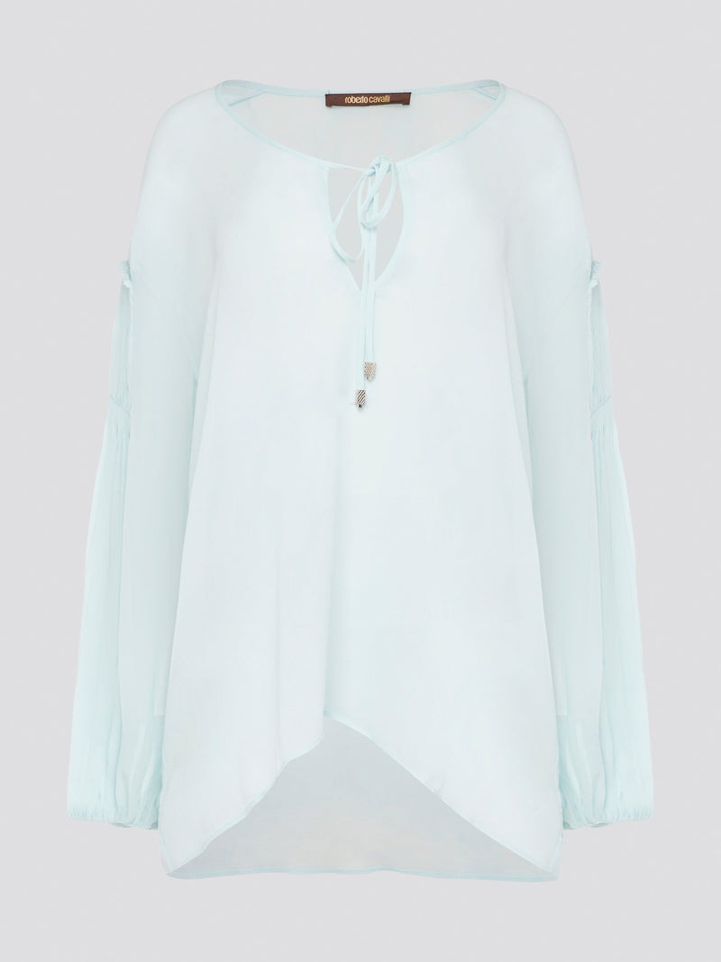 Step up your fashion game with this stunning Mint Green Tie Front Blouse by Roberto Cavalli. The delicate mint green hue and flattering tie front detail will make you stand out in any crowd. Pair it with your favorite jeans for a casual daytime look or dress it up with some sleek trousers for a night out on the town.