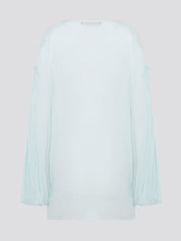 Step up your fashion game with this stunning Mint Green Tie Front Blouse by Roberto Cavalli. The delicate mint green hue and flattering tie front detail will make you stand out in any crowd. Pair it with your favorite jeans for a casual daytime look or dress it up with some sleek trousers for a night out on the town.