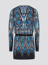 Step out in style with the Roberto Cavalli Printed Tie-Front Cardigan - a chic and sophisticated addition to any outfit. The luxurious fabric and intricate print combine to create a truly eye-catching piece that will effortlessly elevate your wardrobe. Whether paired with jeans for a casual look or layered over a dress for a night out, this cardigan is sure to become a staple in your closet.