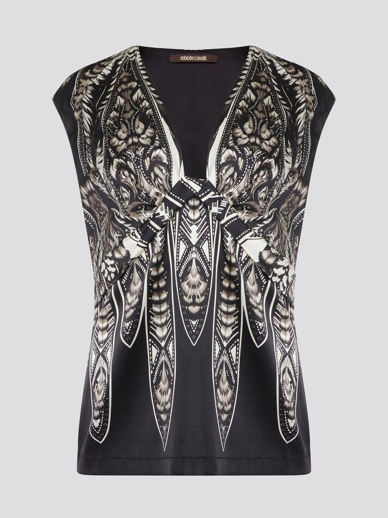 Elevate your summer wardrobe with this effortlessly chic Black Printed Sleeveless Top from Roberto Cavalli. Crafted from luxurious materials, this top features a striking print that is sure to turn heads wherever you go. Pair it with tailored pants for a sophisticated office look, or dress it down with jeans for a casual weekend ensemble.