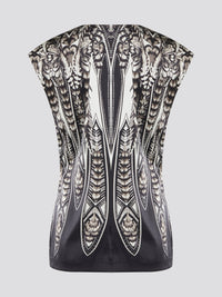 Elevate your summer wardrobe with this effortlessly chic Black Printed Sleeveless Top from Roberto Cavalli. Crafted from luxurious materials, this top features a striking print that is sure to turn heads wherever you go. Pair it with tailored pants for a sophisticated office look, or dress it down with jeans for a casual weekend ensemble.