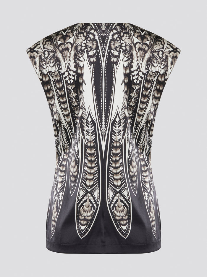 Elevate your summer wardrobe with this effortlessly chic Black Printed Sleeveless Top from Roberto Cavalli. Crafted from luxurious materials, this top features a striking print that is sure to turn heads wherever you go. Pair it with tailored pants for a sophisticated office look, or dress it down with jeans for a casual weekend ensemble.