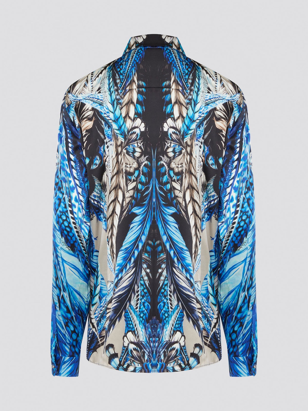 Elevate your wardrobe with the stunning Blue Printed Long Sleeve Blouse by Roberto Cavalli. Featuring a bold and striking print, this blouse is perfect for making a statement wherever you go. Crafted with exquisite attention to detail, this piece will add a touch of luxury and sophistication to any outfit.