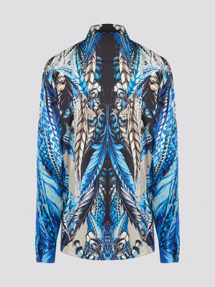 Elevate your wardrobe with the stunning Blue Printed Long Sleeve Blouse by Roberto Cavalli. Featuring a bold and striking print, this blouse is perfect for making a statement wherever you go. Crafted with exquisite attention to detail, this piece will add a touch of luxury and sophistication to any outfit.