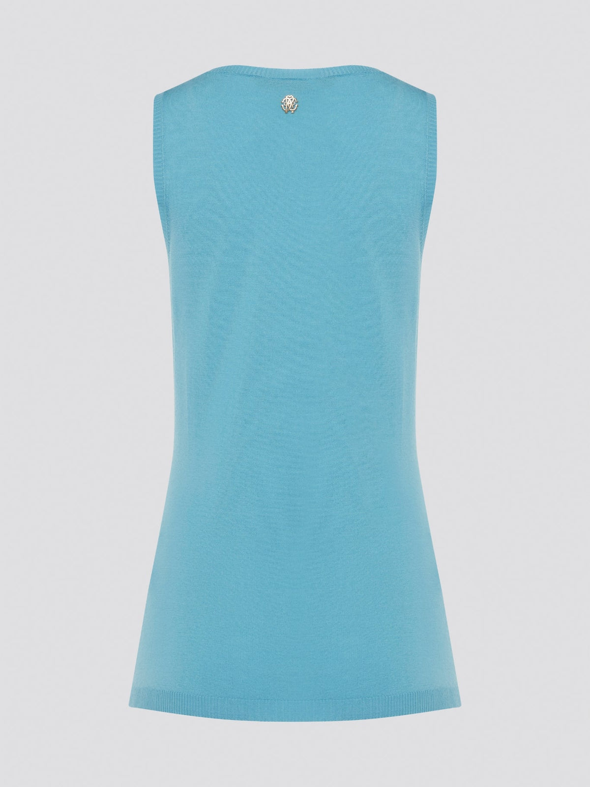 Dive into a sea of luxury with our Blue Sleeveless Top by Roberto Cavalli. Crafted from high-quality materials, this top exudes sophistication and style. Perfect for layering or wearing on its own, this top will elevate any outfit with its stunning blue hue and chic design.