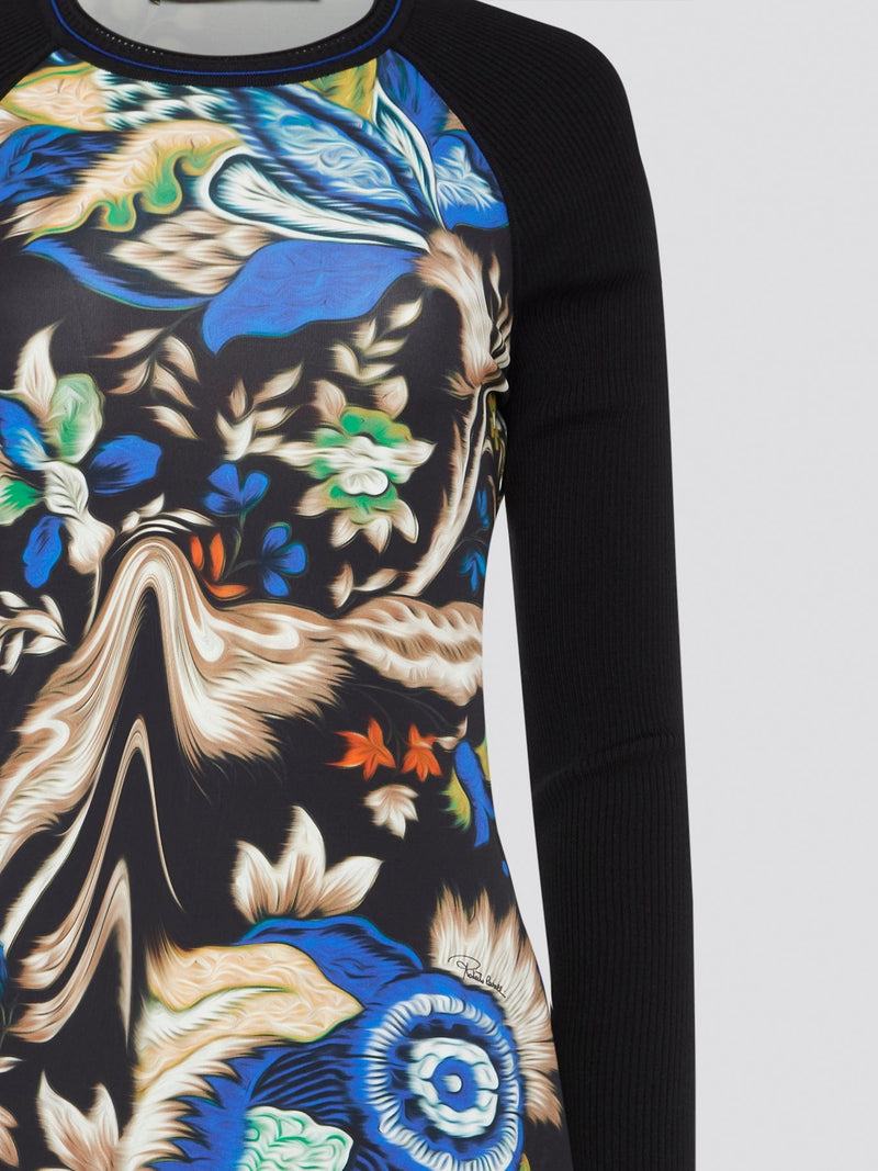 Elevate your wardrobe with this stunning Printed Long Sleeve Dress by Roberto Cavalli. The vibrant print and luxurious fabric make it a perfect choice for any special occasion or night out. Stand out in style and turn heads wherever you go in this show-stopping piece.