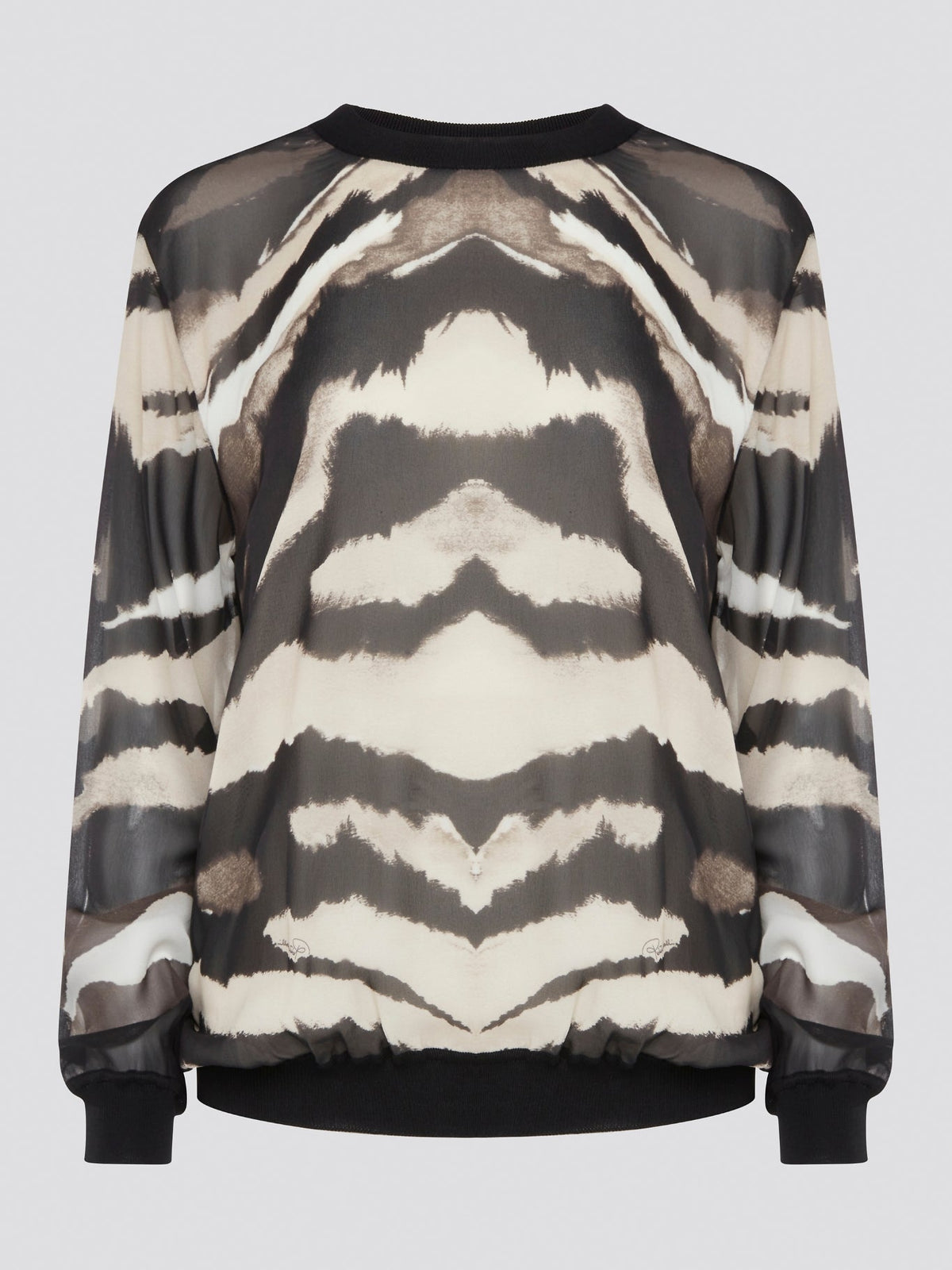 Make a fierce fashion statement with the Roberto Cavalli Zebra Print Sweatshirt, featuring a bold and eye-catching zebra print design. Crafted from premium materials, this sweatshirt offers both style and comfort for all-day wear. Elevate your street style with this standout piece that is sure to turn heads wherever you go.