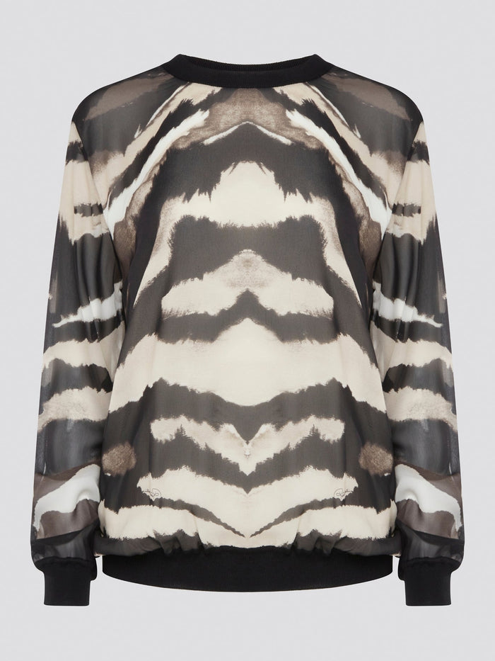 Make a fierce fashion statement with the Roberto Cavalli Zebra Print Sweatshirt, featuring a bold and eye-catching zebra print design. Crafted from premium materials, this sweatshirt offers both style and comfort for all-day wear. Elevate your street style with this standout piece that is sure to turn heads wherever you go.