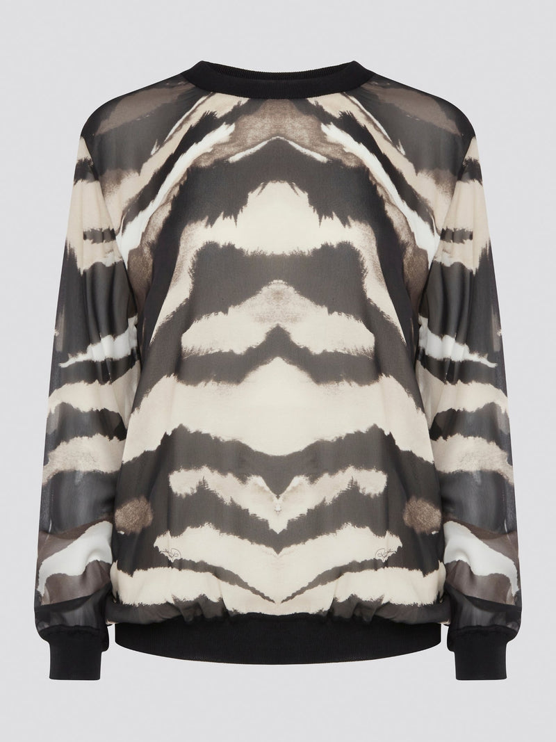 Make a fierce fashion statement with the Roberto Cavalli Zebra Print Sweatshirt, featuring a bold and eye-catching zebra print design. Crafted from premium materials, this sweatshirt offers both style and comfort for all-day wear. Elevate your street style with this standout piece that is sure to turn heads wherever you go.