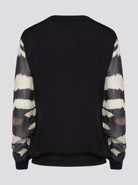 Make a fierce fashion statement with the Roberto Cavalli Zebra Print Sweatshirt, featuring a bold and eye-catching zebra print design. Crafted from premium materials, this sweatshirt offers both style and comfort for all-day wear. Elevate your street style with this standout piece that is sure to turn heads wherever you go.